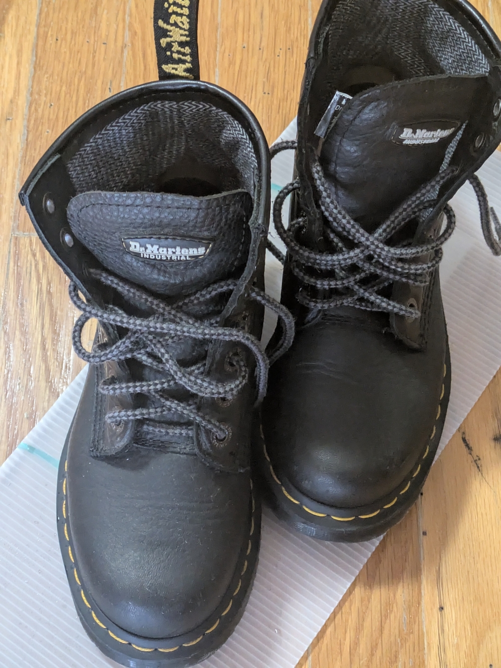 Dr. Martens Kids Black Leather Lace-Up Boots with Yellow Stitching